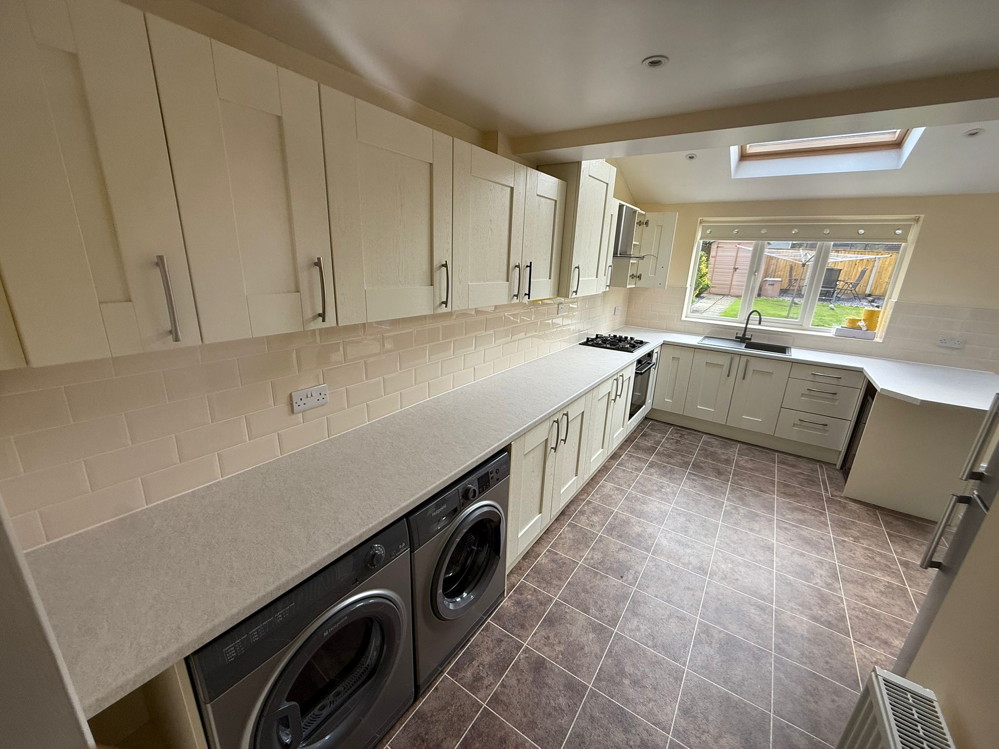 White kitchen before respraying by Saddleworth Spraying Manchester